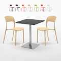 Schwarz Tisch Quadratisch 60x60 mit Stahlfuß Bunte Stühle Restaurant Pistachio Verkauf