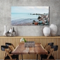Leinwanddruck Meereslandschaft Kieselsteine am Strand Pangea Images Verkauf