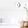 Moderne minimalistische runde Wand uhr in Weiß und Schwarz Eclissi Aktion